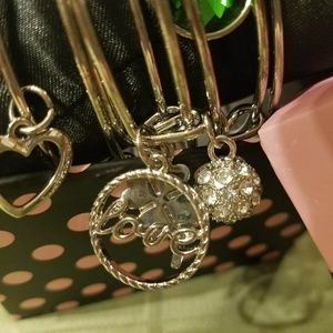 Set of New bangle bracelets with charms